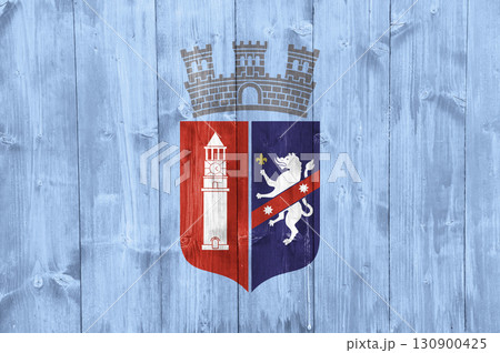 Official flag of the capital of Albania, Tirana, on wood texture. Conceptual collage Official flag of the capital of Albania, Tirana, on wood texture. Conceptual collage 130900425