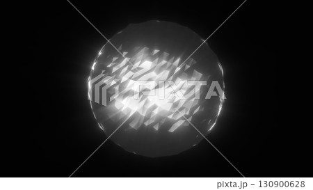Radiant white glowing crystal sphere with faceted polygonal surface, emitting light in a dark abstract background 130900628