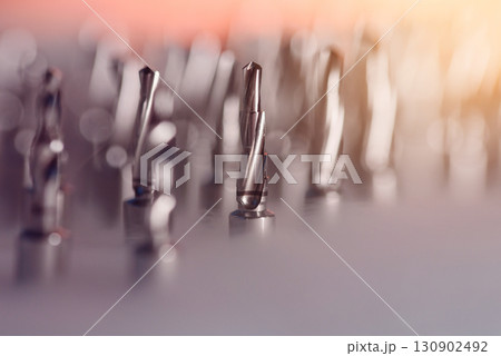 Full set of dental implant drill bits in surgical tray, close-up of professional dentistry equipment Full set of dental implant drill bits in surgical tray, close-up of professional dentistry equipment 130902492