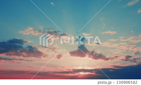 A Stunning Sunrise Over a Vibrant Sky with Beautiful Clouds and a Magical Atmosphere 130906582