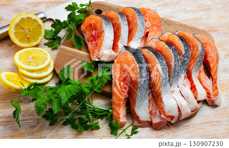 Raw seafood, fresh fillet salmon fish on board 130907230