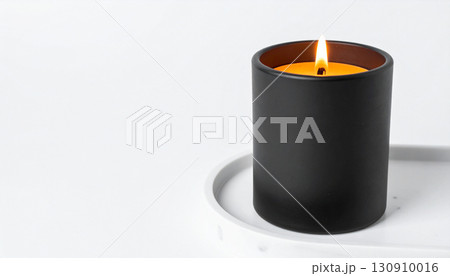 Matte Black Candle with Orange Flame on Marble Tray. Hallowen Concept. Generated Image Matte Black Candle with Orange Flame on Marble Tray. Hallowen Concept. Generated Image 130910016