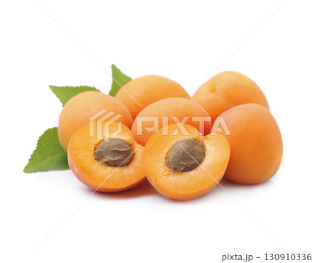 Sweet apricots with leaves on white backgrounds 130910336