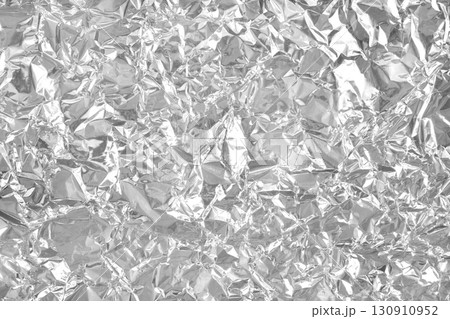 Silver foil leaf shiny texture, abstract grey wrapping paper for background and design art work. 130910952