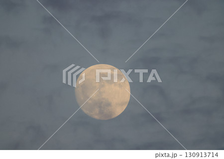 Sept 6 2025 Full Moon with Gentle Clouds in a Soft Sky During Evening Twilight Sept 6 2025 Full Moon with Gentle Clouds in a Soft Sky During Evening Twilight 130913714