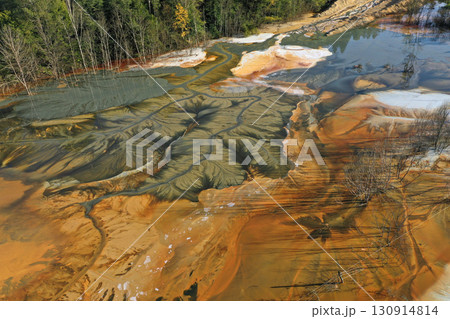 Aerial view of a big waste decanting lake, tailing pond. Mining residual waters discharged from copper mine 130914814