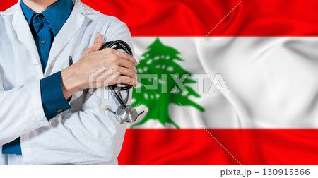 Doctor with stethoscope on Lebanon flag. Doctor holding stethoscope on Lebanon flag Doctor with stethoscope on Lebanon flag. Doctor holding stethoscope on Lebanon flag 130915366
