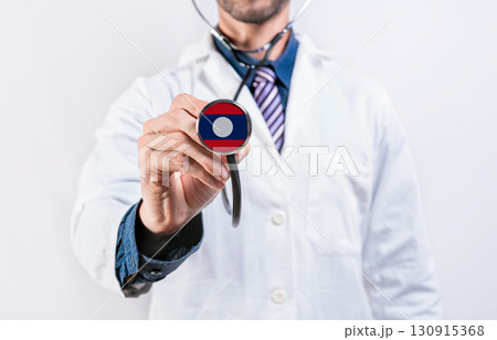 Laos healthcare system, doctor holding stethoscope. Laos health and medical insurance concept 130915368