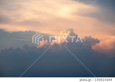 Evening clouds create a peaceful and stunning view Evening clouds create a peaceful and stunning view 130915844