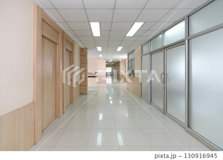 Corridor between different room in hospital. Medical operating room and patient sample storage room. 130916945