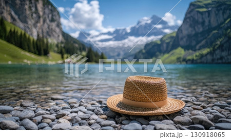 Summer hat by a serene alpine lake. 130918065