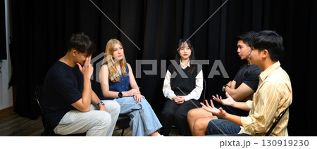 Group counseling session with participants seated in a circle, focusing on mental health support Group counseling session with participants seated in a circle, focusing on mental health support 130919230