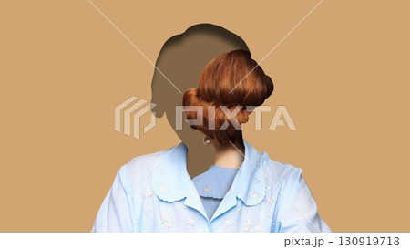 Creative digital artwork. Faceless woman with red hair bun inside silhouette on beige background 130919718