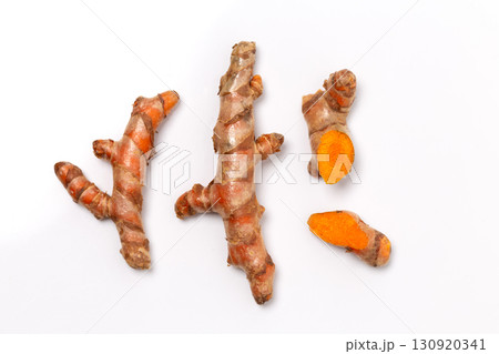 Dry Turmeric powder and turmeric root isolated on white background ,Top view Dry Turmeric powder and turmeric root isolated on white background ,Top view 130920341