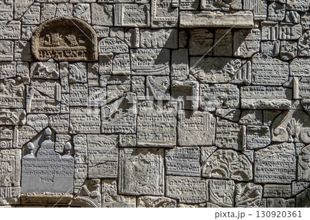 Poland, Krakow, Jewish Quarter of Krakow, Jewish tombstones forming a wall in the Remuh Synagogue cemetery 130920361