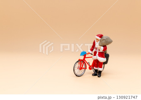 Miniature Santa Claus Riding Bicycle with Gift Bag Miniature Santa Claus Riding Bicycle with Gift Bag 130921747