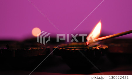 Warm candlelight shining in celebration night 130922421