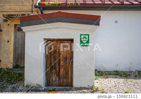 Shelter entrance with Latvian safety sign patvertne 130923111
