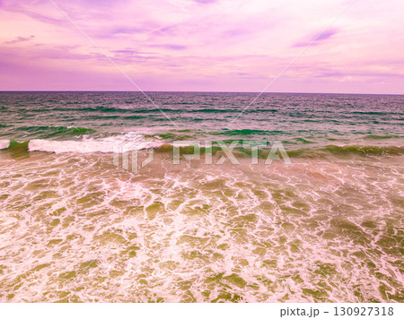 Aerial view Beautiful view sunset over sea surface beautiful wave Amazing light sunset or sunrise sky over sea beach with wave crashing in the ocean.nature background 130927318