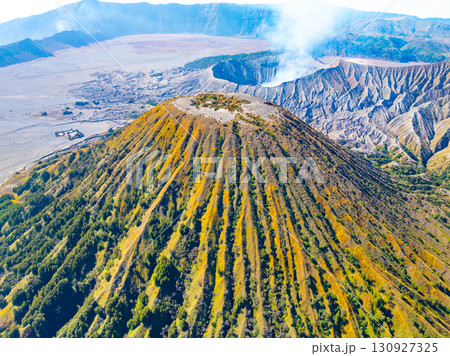 Aerial view Mountains at Bromo volcano during sunrise sky,Beautiful Mountains Penanjakan in Bromo Tengger Semeru National Park,East Java,Indonesia.Nature landscape background 130927325