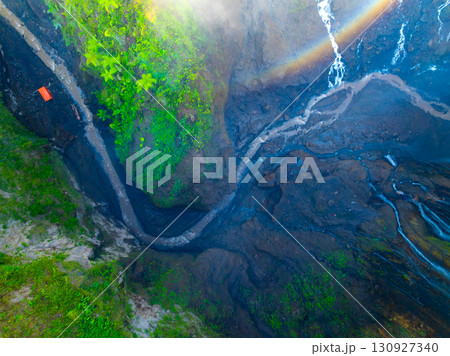 Aerial view of the Tumpak Sewu Waterfalls also known as Coban Sewu.Beautiful Tumpak Sewu Waterfalls are a tourist attraction in East Java, Indonesia.Amazing travel destination in asia 130927340