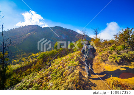 Beautiful landscape view Mountains with fog in sunrise sky at Indonesia 130927350