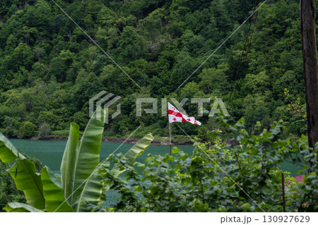 The Georgian flag in the distance by the Chorukh River 130927629