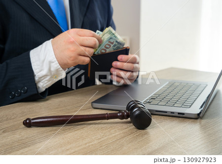 Payment of fines after a court decision. Payment of penalties under a contract. The employer pays compensation to the employee. Symbol of justice, accountability, corporate risks, financial discipline Payment of fines after a court decision. Payment of penalties under a contract. The employer pays compensation to the employee. Symbol of justice, accountability, corporate risks, financial discipline 130927923