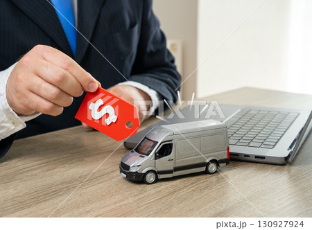 Purchase of new vans for logistics operations and transportation. Sale of new vans. Symbol of supply chains, delivery expansion, modernization of fleets, e-commerce logistics and trade efficiency. 130927924