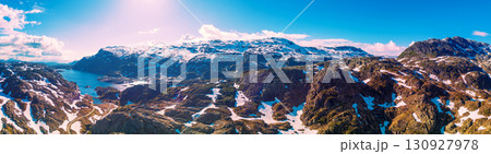 View from above to a lake in the mountains in summer. Highland Nature Park in the municipality of Sauda. Beautiful nature of Norway, Europe View from above to a lake in the mountains in summer. Highland Nature Park in the municipality of Sauda. Beautiful nature of Norway, Europe 130927978