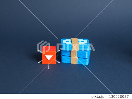 Depreciation of money. Reduction of capital and depletion of deposit at auction. Symbol of financial instability, inflation, currency crisis, banking sector decline, and savings erosion. Depreciation of money. Reduction of capital and depletion of deposit at auction. Symbol of financial instability, inflation, currency crisis, banking sector decline, and savings erosion. 130928027