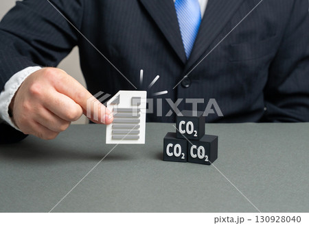A document limiting carbon dioxide emissions into the atmosphere. Greenhouse gas emission quotas. Concept of climate policy, sustainability and environmental law. Useful for research and reports. A document limiting carbon dioxide emissions into the atmosphere. Greenhouse gas emission quotas. Concept of climate policy, sustainability and environmental law. Useful for research and reports. 130928040