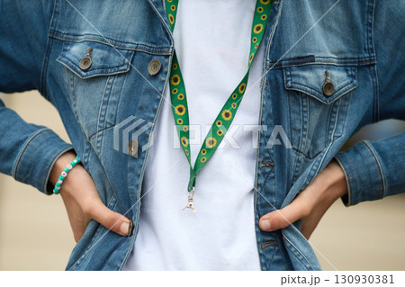 Sunflower lanyard, symbol of people with invisible or hidden disabilities. Sunflower lanyard, symbol of people with invisible or hidden disabilities. 130930381