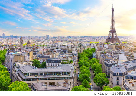 Beautiful skyline of Paris, view of Eiffel Tower, rooftops and business district Beautiful skyline of Paris, view of Eiffel Tower, rooftops and business district 130930391