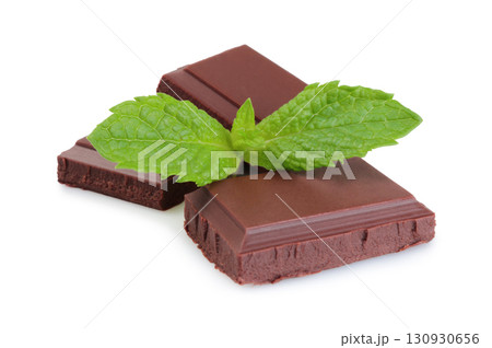 Chocolate bars with green mint leaves, isolated on transparent background. Culinary and sweet food concept Chocolate bars with green mint leaves, isolated on transparent background. Culinary and sweet food concept 130930656