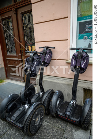 Segways for rent parked on a sidewalk in Salzburg, Austria 130930690