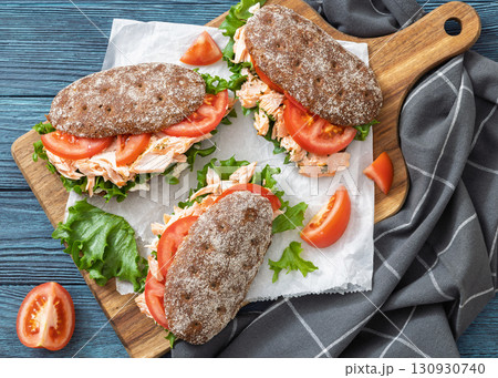 rye bread sandwiches with grilled salmon, veggies rye bread sandwiches with grilled salmon, veggies 130930740
