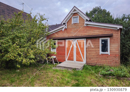 Closed wooden barn, country house. Closed wooden barn, country house. 130930879