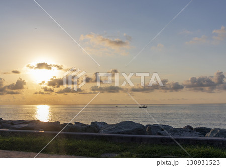 Dramatic sunset by the sea Dramatic sunset by the sea 130931523