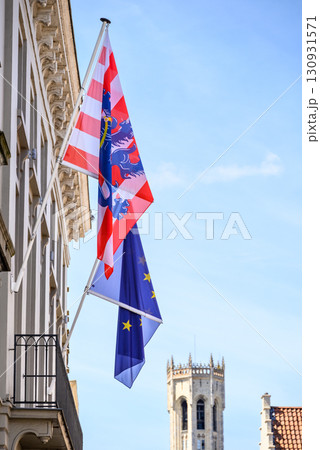 Flags of Austria and the European Union on a building facade. 130931571