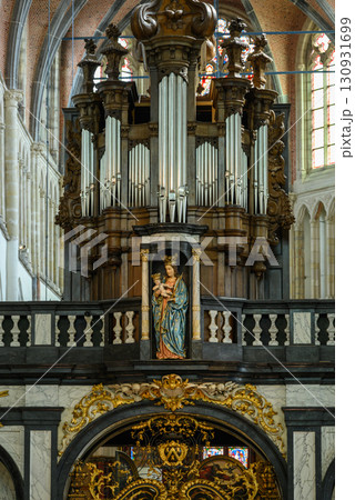 Organ in the Church of Our Lady Roman Catholic gothic church in Bruges, Belgium 130931699