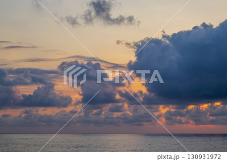Dramatic sunset by the sea Dramatic sunset by the sea 130931972