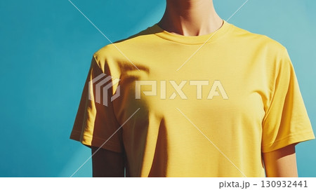 Model is wearing blank T-Shirt. Mockup For Your Design 130932441