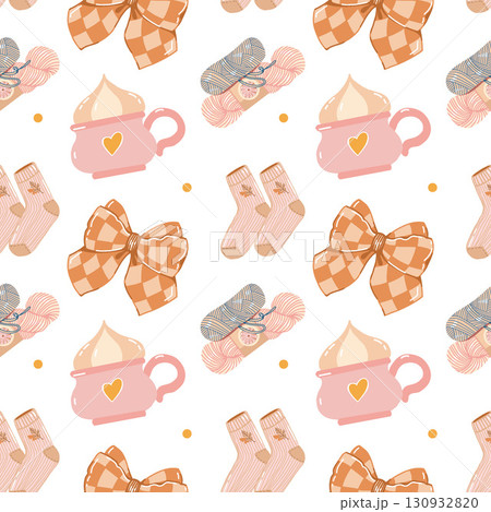 A cozy seamless pattern for girls and women with autumn attributes. A cup, yarn, bow, and socks. Vector flat illustration in pink and brown shades on a white background. 130932820