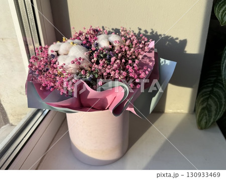 Beautiful decorative flower in the office of the company. High quality photo Beautiful decorative flower in the office of the company. High quality photo 130933469