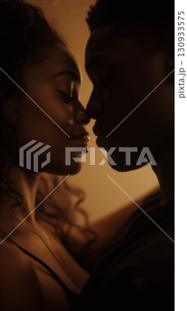 Delicate pink lotus flower gently resting on the water surface among green leaves with water droplets tranquility Delicate pink lotus flower gently resting on the water surface among green leaves with water droplets tranquility 130933575