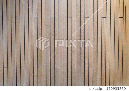 Teak wood deck texture background. Wooden deck on super yacht. Yachting concept. 130933880