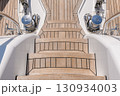 Teak stairs ladder on luxury yacht. Elements of yacht construction. Superyacht concept. 130934003