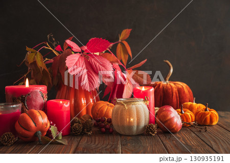 Autumn Still Life with Pumpkins, Candles and Seasonal Decorations Autumn Still Life with Pumpkins, Candles and Seasonal Decorations 130935191