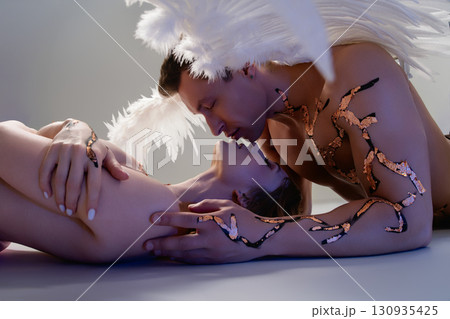Intimate moment shared between two lovers in artistic expression Intimate moment shared between two lovers in artistic expression 130935425